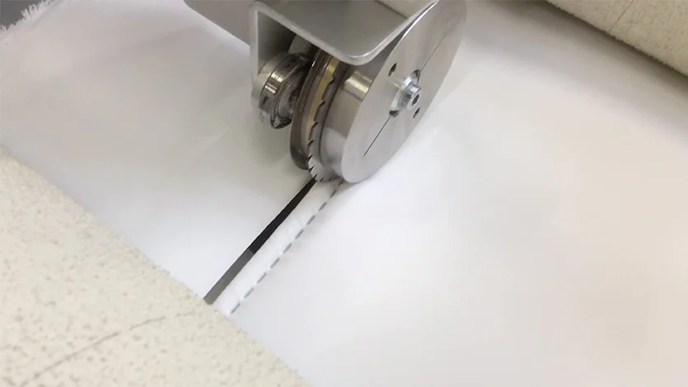 Impianto ad ultrasuoni di taglio e saldatura per produzione trapunte